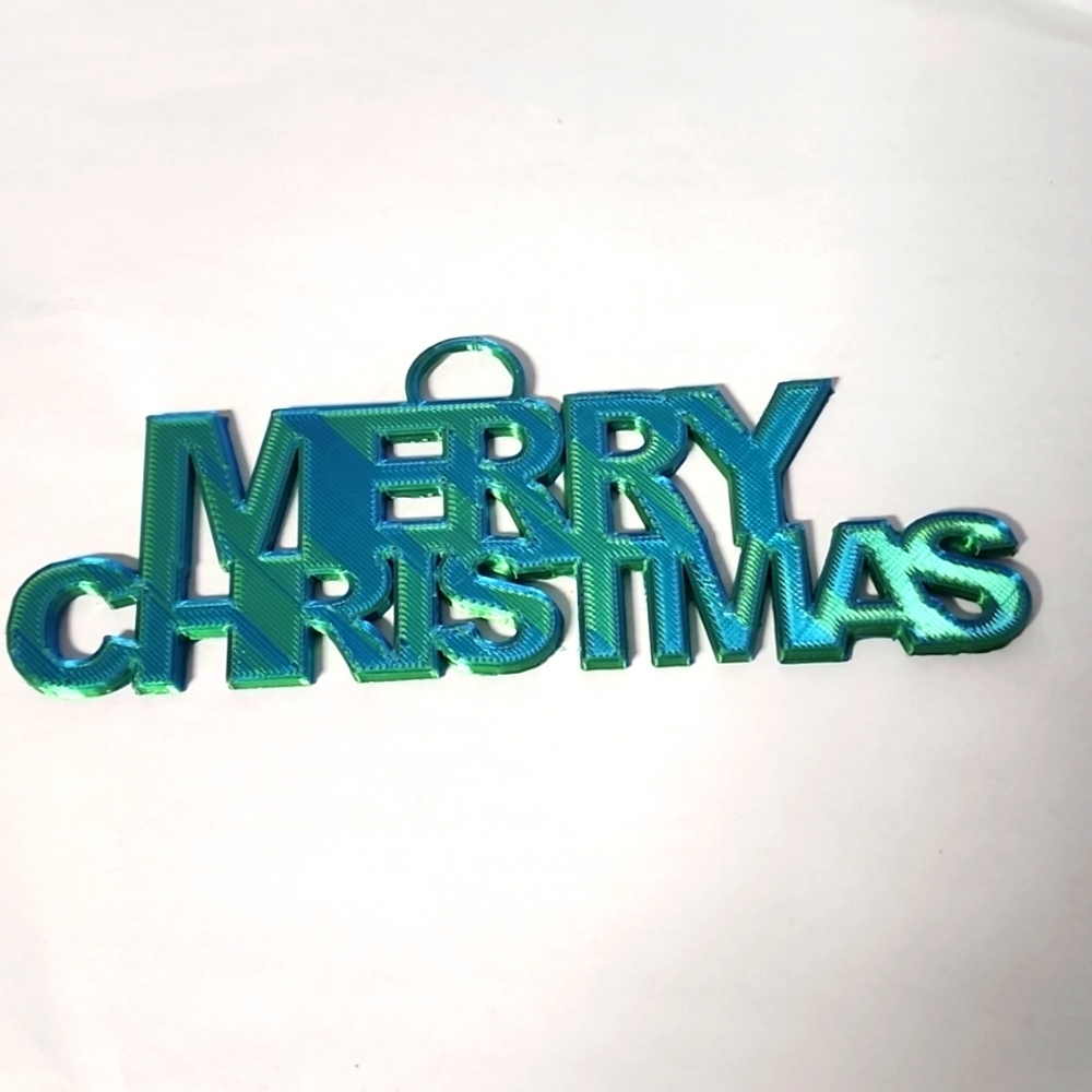 Merry Christmas Tree Decoration, Green.  7" x 2.5"